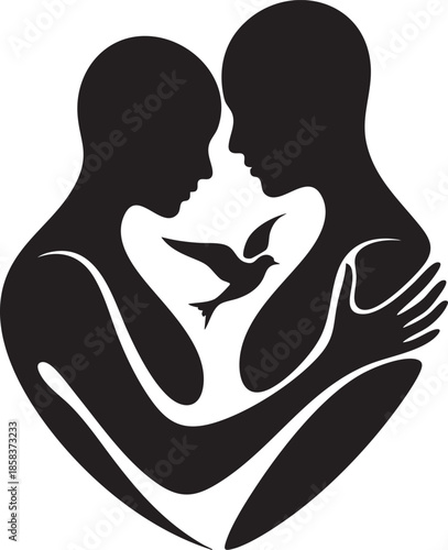 Silhouetted couple embracing warmly with a bird in flight between them