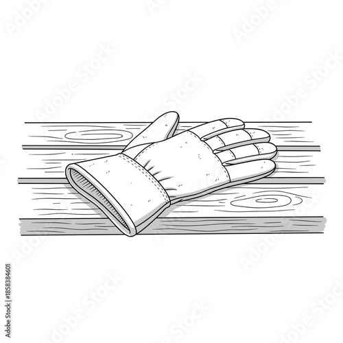 Sturdy work glove resting palm-up on rustic wooden bench  