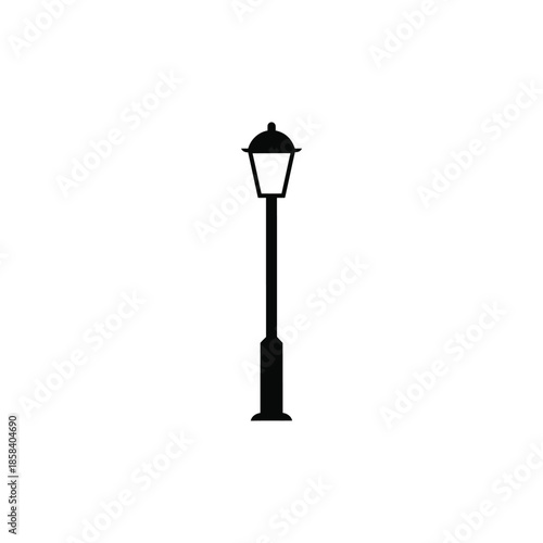 A black silhouette illustration of a traditional street lamp post against a clean white background