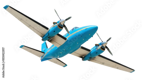 Isolated blue and tan twin-engine light aircraft angled in flight, propellers spinning