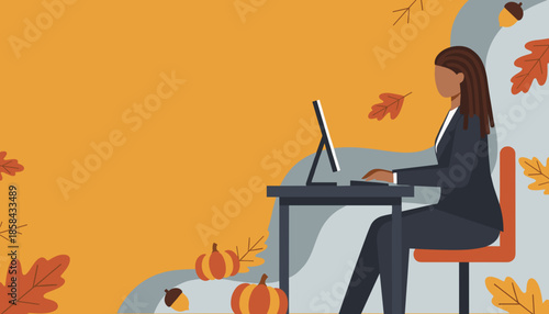 Professional Black woman working remotely on a desktop with autumn decor Seasonal work concept