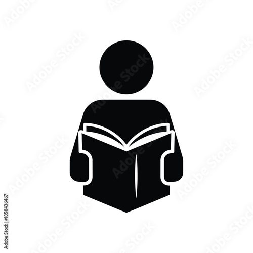 a simple black and white icon depicts a person intently reading an open book suggesting learning and knowledge high quality professional