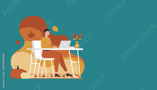 Cozy fall remote work Person using laptop at a desk with pumpkins and autumn leaves decoration