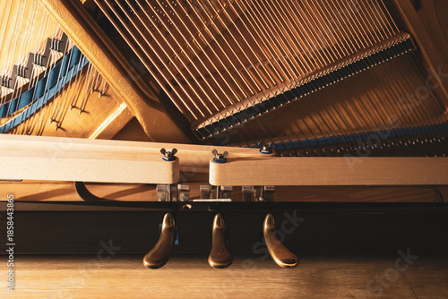 Upright piano details in cozy indoor night lighting