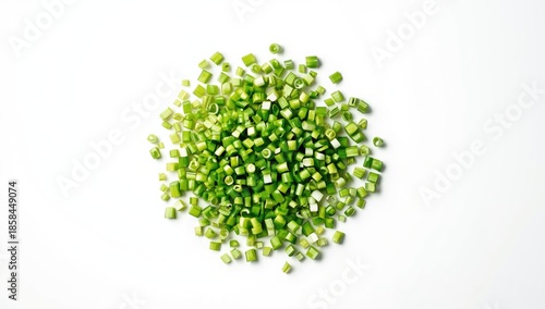 Green onion pieces arranged on a plain white surface, ideal for culinary or food presentation backgrounds