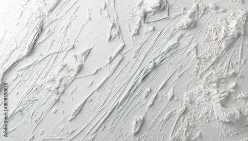 White textured filler surface with irregular strokes from a putty knife, used for background or texture in design
