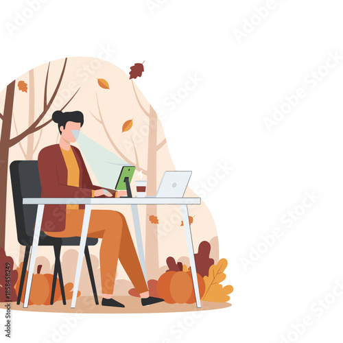 Digital nomad works remotely on a laptop and tablet in a festive autumn park decorated with falling leaves and pumpkins