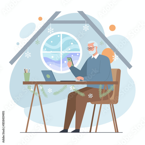 Senior man uses smartphone and laptop for remote work in a winter home office decorated with snowflakes