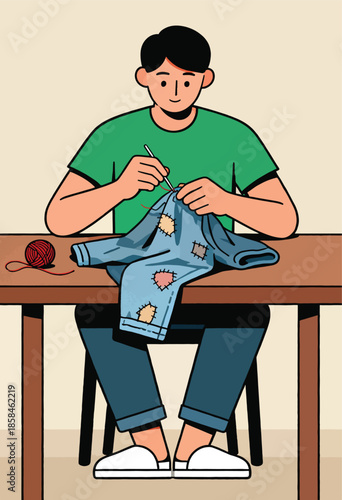 A person sits at a table, sewing patches onto blue jeans with red thread