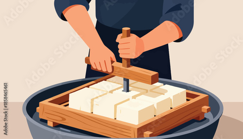 Person pressing fresh tofu in a traditional wooden mold
