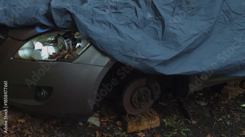 Wallpaper Mural Headlight revealed damage, Closeup shows headlight damage with muddy surroundings and dented bumper Torontodigital.ca