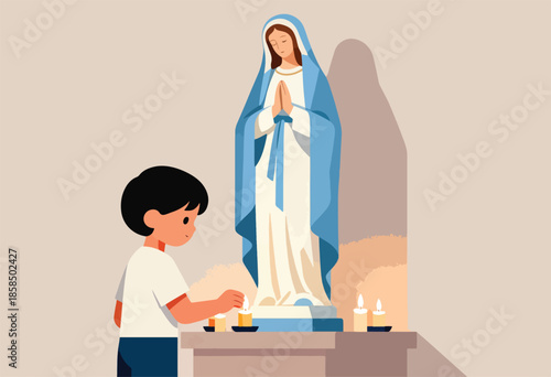 Child lights candles before statue of praying figure