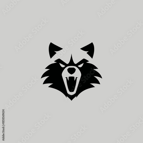 Bold black raccoon head graphic with menacing expression on neutral background