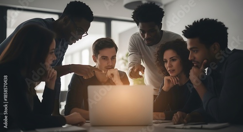 Team collaborating on laptop