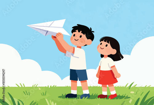 Children enjoy a summer day by flying a paper airplane in a grassy field