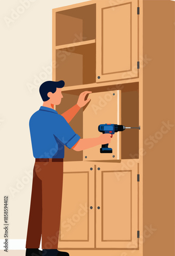A man uses a drill to attach a panel to a wooden cabinet
