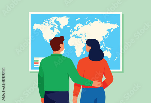Couple looks at world map, planning adventures or business ventures