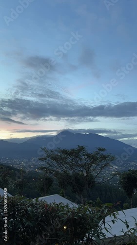 Morning Timelapse of Mountain Landscape and City Awakening at Sunrise