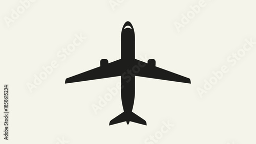 Top down view silhouette of a passenger airplane ready for takeoff or landing in bright studio