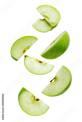 Green apple slices in mid-air.  Fresh, healthy, vibrant,  slices,  flying