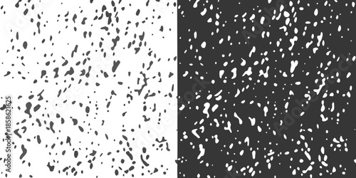 A stark contrast black and white speckled pattern split vertically