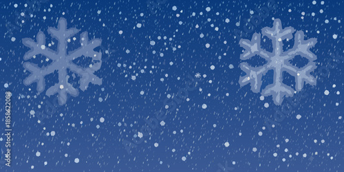 A winter background featuring delicate snowflakes on a deep blue gradient