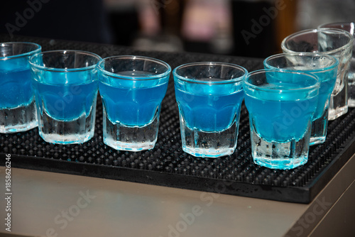 Принти на полотні several shots of a Blue Kamikaze cocktail