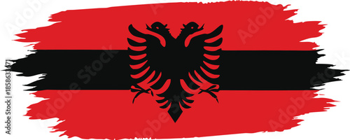 albania flag with red black brush paint strokes and eagle