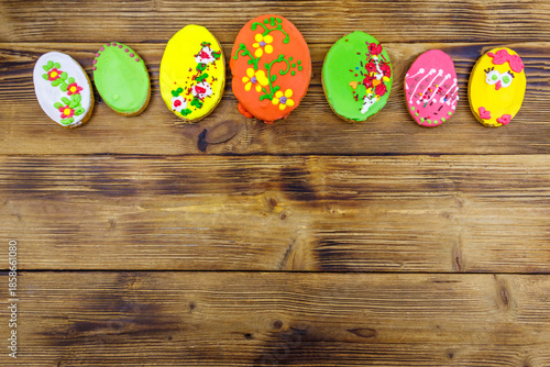 Wallpaper Mural Egg shaped easter gingerbread cookies on wooden table. Top view, copy space. Sweets for celebrate Easter Torontodigital.ca