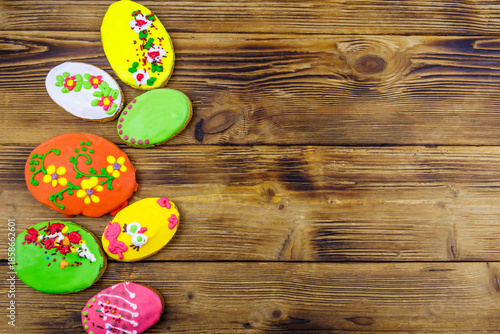 Wallpaper Mural Egg shaped easter gingerbread cookies on wooden table. Top view, copy space. Sweets for celebrate Easter Torontodigital.ca