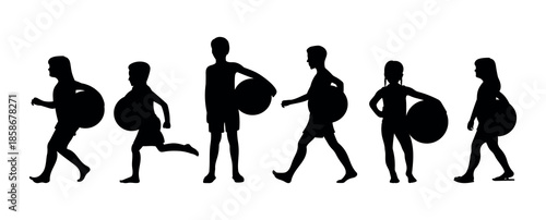 Silhouette of a child running and standing while carrying a beach ball showing play activities, active movement, and the joy of childhood