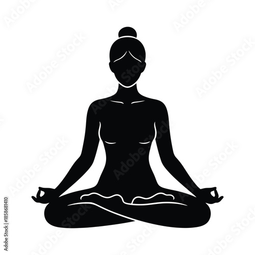 Black silhouette of a woman meditating in lotus pose with hands in mudra yoga meditation