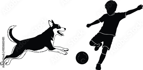 Black silhouette of a young boy playing soccer with a happy dog, concept of childhood fun, active lifestyle and pets