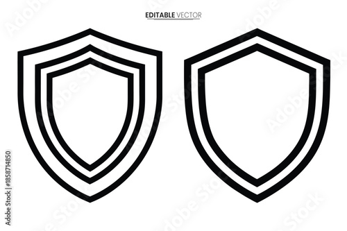 Two black and white shield outlines are displayed appearing as protective emblems or heraldic symbols
