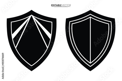 Two black shield vector illustrations with different internal designs suitable for diverse protective applications
