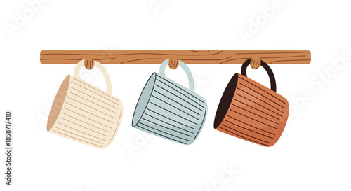 Practical kitchen accessory illustration showing three striped ceramic mugs in white, blue, and brown hanging from a simple wooden wall rack.