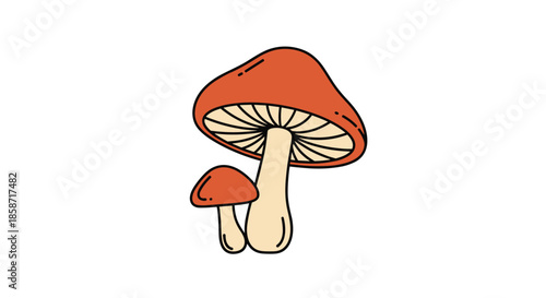 Pair of brown mushrooms with different sizes grows together on the wild forest floor as a symbol of nature and healthy organic plant life.