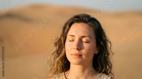 Serene woman with closed eyes in desert sunlight for wellness meditation mindfulness and mental health lifestyle advertising