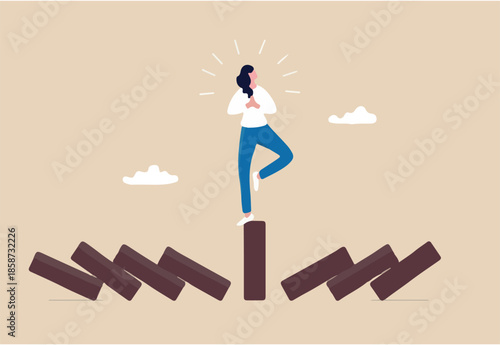Mindfulness meditation relax to reduce stress and eliminate distraction, calm to build energy or spiritual wellness concept, success woman relax and meditating with yoga pose on standing domino