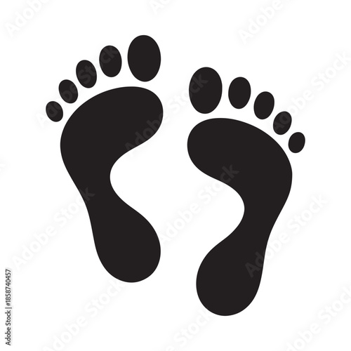 A simple black and white illustration of two human footprints facing forward