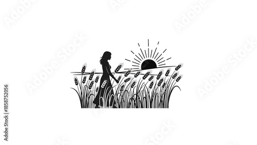 A black silhouette of a woman walking through a field of wheat stalks under a rising or setting sun
