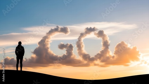 Silhouette of a person looking at the clouds with the word 