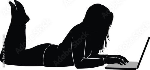 Woman silhouette working on laptop while lying on floor, representing remote work, online learning, freelance lifestyle, technology use, modern digital living