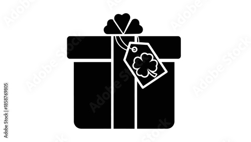 Black gift box with a tag and heart shaped bow.