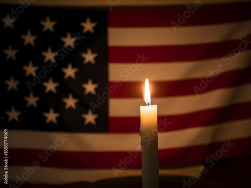 American flag with a lit candle on national day