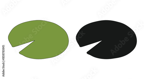 A vibrant green lily pad alongside a dark shadowed circular form