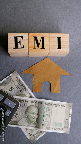 Home Loan EMI Concept with Indian rupees and calculator.