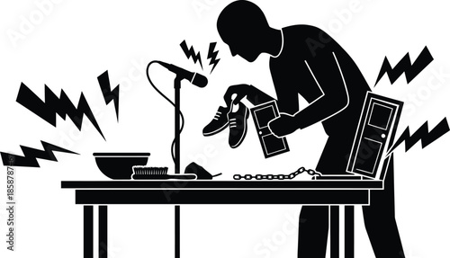 Silhouette of professional foley artist creating sound effects for movie post production by hitting shoes on small door prop near microphone on table in studio.