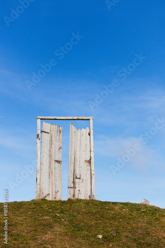 Door to Nowhere - Abstract concept: going beyond, crossing a threshold, overcoming limits,