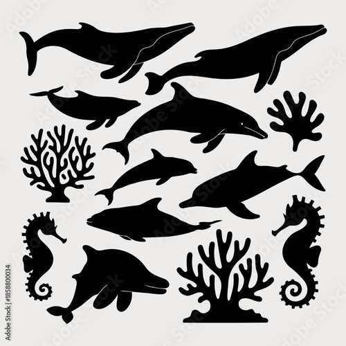 Black silhouettes of various marine animals including whales, dolphins, seahorses, and coral reefs
